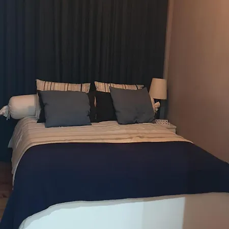 Quarto Aconchegante Com Janela E Vista Para Cidade Habitación en casa particular Lisboa
